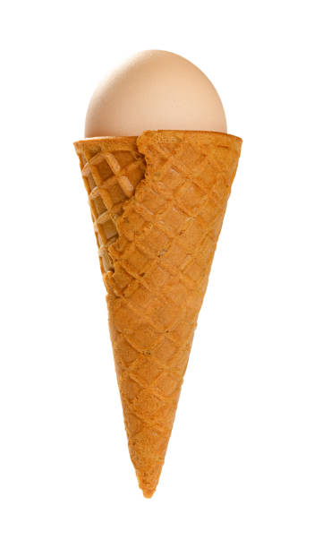 istock ice cream cone with an egg on white background with clipping path 1158518873