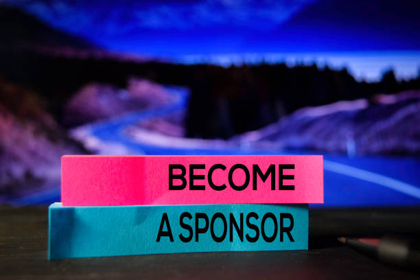 istock Become A Sponsor on the sticky notes with bokeh background 1158519131