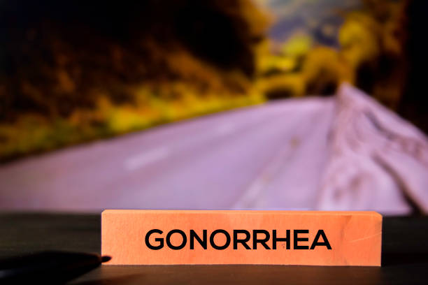 Gonorrhea on the sticky notes with bokeh background