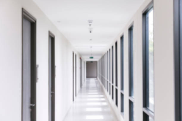istock Blur background of condominium walkway 1158520819