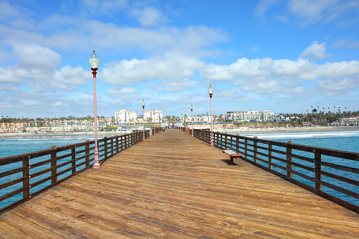 The Oceanside Pier, located in Oceanside, in northern San Diego County, California, is a wooden pier on the western United States