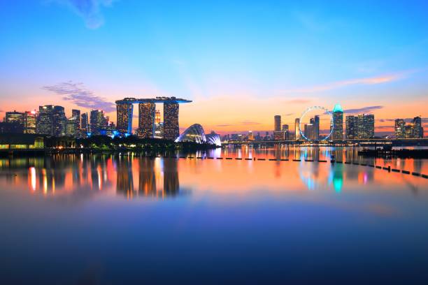 Singapore Night Skyline (After Sunset) at the Marina Bay This Singapore night skyline was taken from the Marina Barrage after sunset. singapore photos stock pictures, royalty-free photos & images