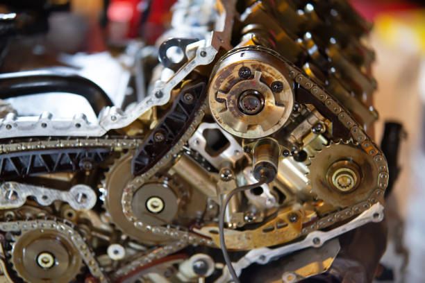 istock v8 engine out on hoist to get rebuilt 1158527676