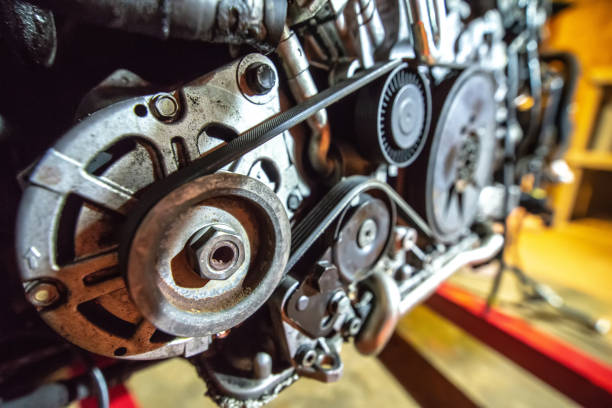 istock v8 engine out on hoist to get rebuilt 1158527879
