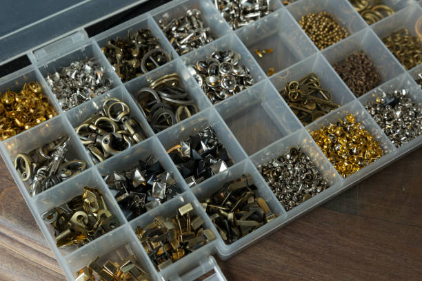 istock Pins, buttons, and accessories for leather work in box 1158527911