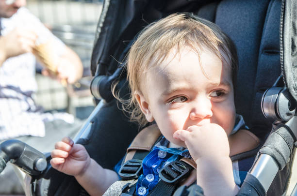 istock Headshot on baby boy in stroller 1158528707