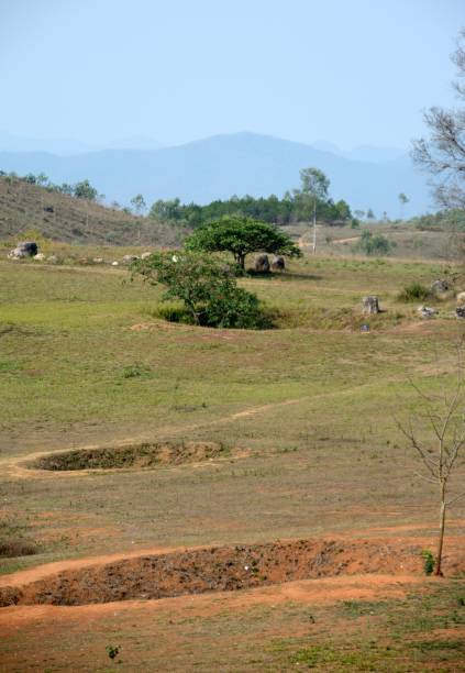 istock Bomb craters at Plain of Jars, Phonsavan, Xieng khouang Plateau, Laos 1158529202