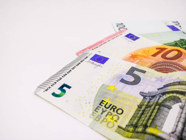 istock Euro banknotes grouped on a white background 1158531788