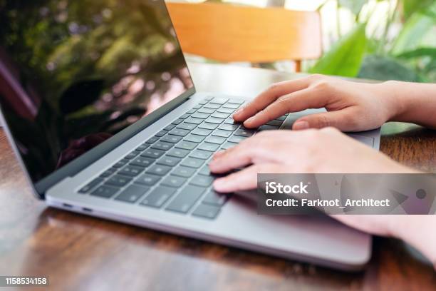 User Typing Computer Hands Using And Typing On Laptop Computer Keyboard Stock Photo ...