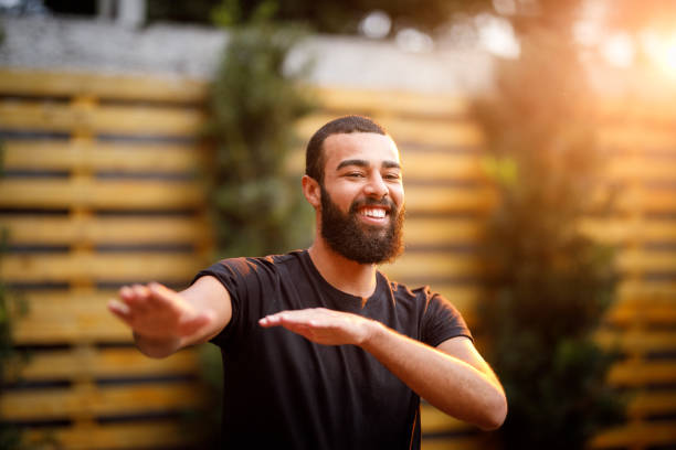 istock Man dancing at outdoor party 1158538137