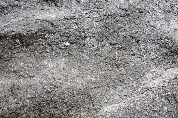 istock The surface texture of natural stone blocks. 1158538883