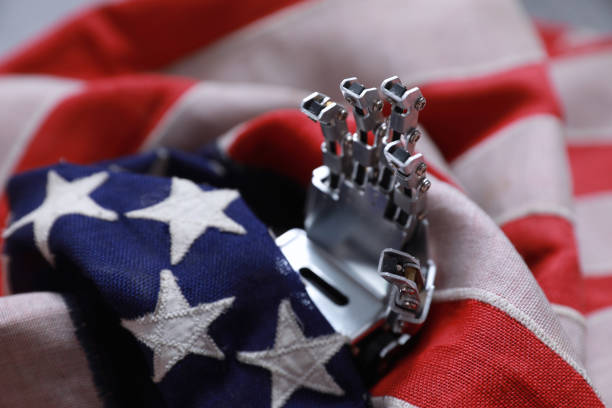 Robot with thumbs up against american flag