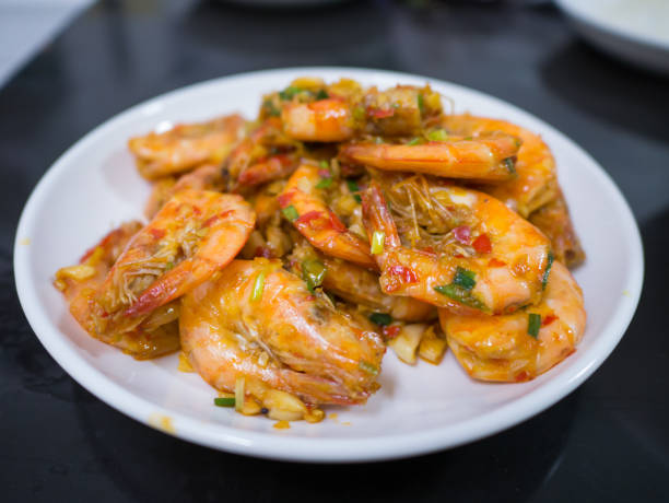 istock deep fried stir shrimp with chili and garlic on white dish 1158541220