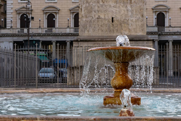 istock Fountain in Piazza Colonna square designed in 1577 in Rome. Italy 1158542413