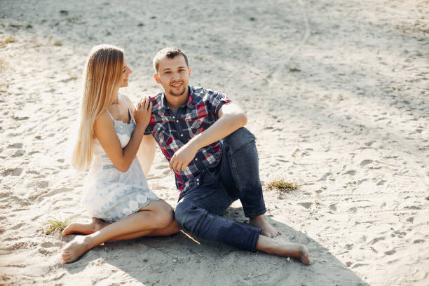 istock Beautiful couple spend time in a summer park 1158545050