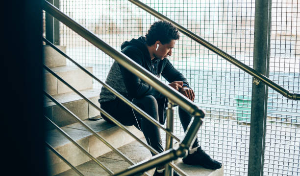 istock Athlete looking at his smart watch 1158550254
