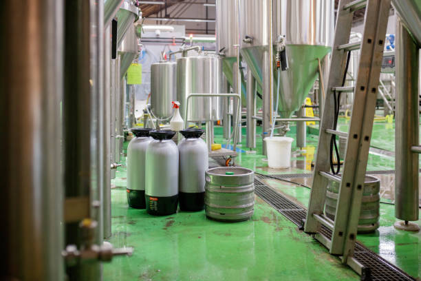 istock Storage tanks, kegs and barrels in brewery 1158551534