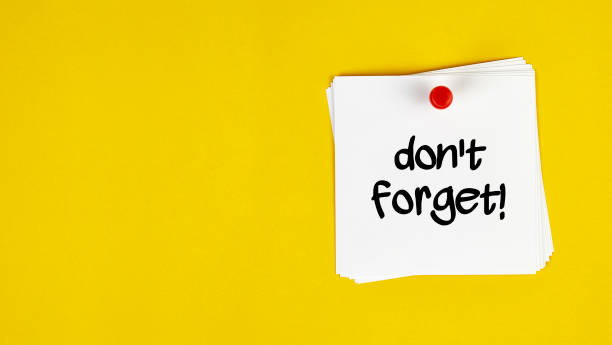 istock White Sticky Note With Don't Forget Message And Red Push Pin On Yellow Background 1158552661
