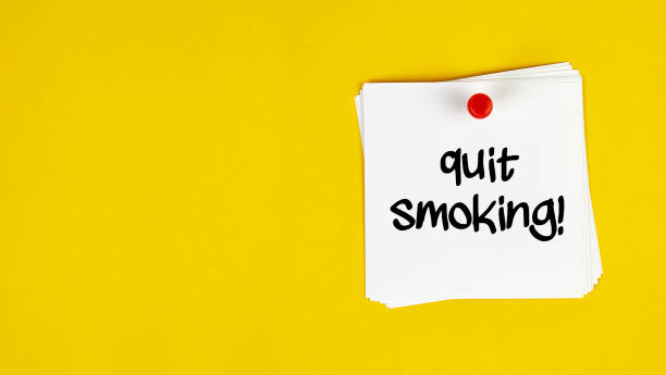 istock White Sticky Note With Quit Smoking Message And Red Push Pin On Yellow Background 1158552668