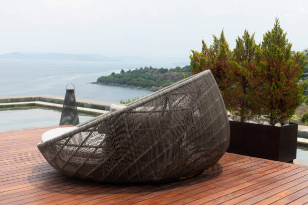 istock Round rattan Sofa at the pool 1158554060