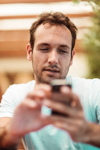 istock man checking the phone 1158555505