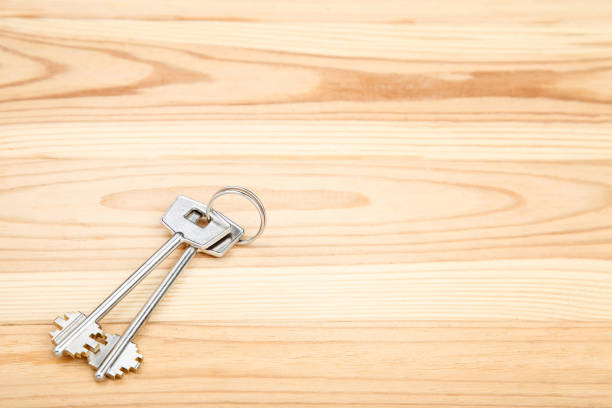 istock House keys on brown wooden table 1158557252