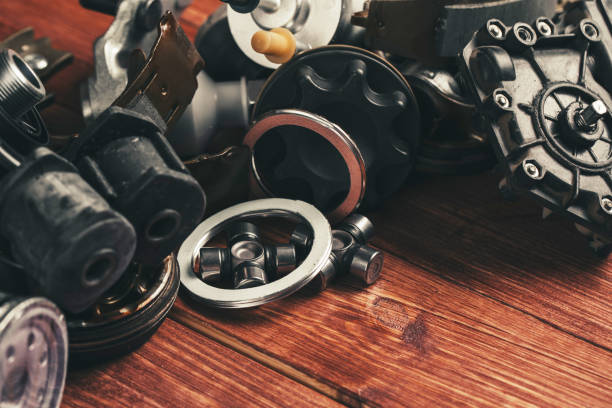 istock Various car parts on dark woooden background 1158559456