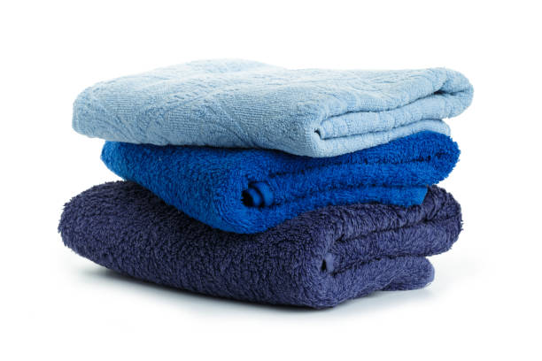 istock Stacked coloful  towels isolated on white background 1158559550