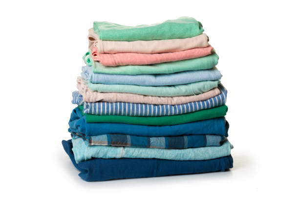 istock stack of clothing isolated on white background 1158559847