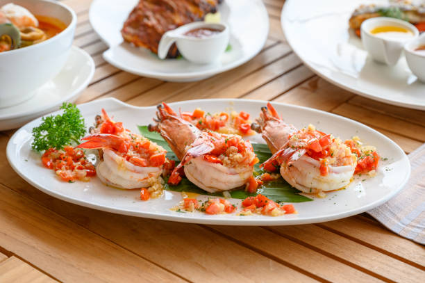 istock Spicy chili grilled prawns in white plate 1158560166