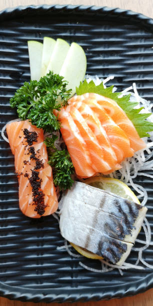 istock Close up slice of salmon sashimi 1158561650