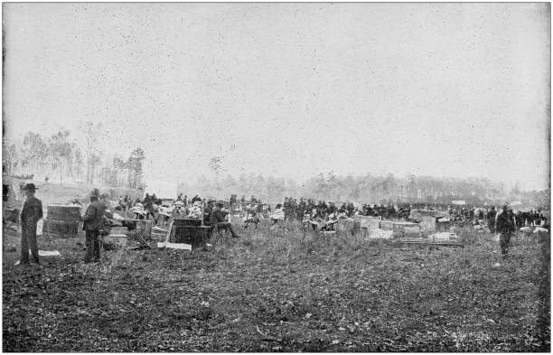 istock US Army black and white photos: Infantry Pitching Camp in Chickamauga 1158562908