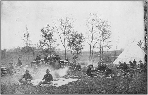 istock US Army black and white photos: Camp meal 1158570282