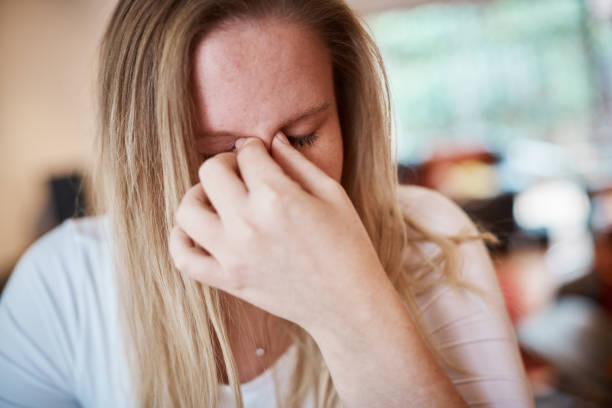 istock Young woman is tired, sad, stressed, depressed or overworked 1158570548