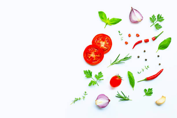 istock Various fresh vegetables and herbs on white background. Healthy eating concept 1158571144