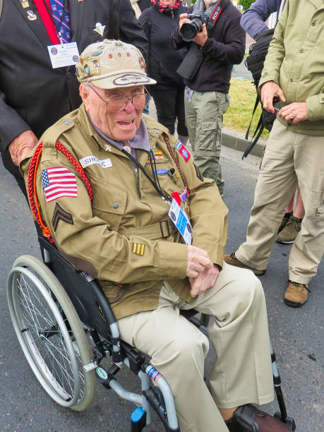 D-Day remembrance 75 birthday in Normandy, France 2019. SAINTE MERE, NORMANDY, FRANCE - JUNE 06, 2019. D Day 75 birthday of french liberation by allied countries. Ceremony to remind what american, british, canadian soldiers did during world war two. Old veteran who participated to liberation caen photos stock pictures, royalty-free photos & images