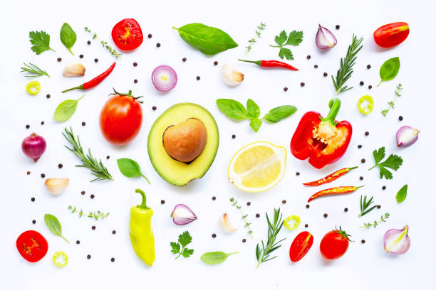istock Various fresh vegetables and herbs on white background. Healthy eating concept 1158571220