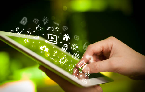 istock Finger pointing on tablet pc, social media concept 1158573561