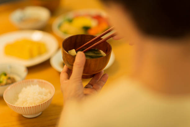 istock Senior women eating dinner 1158574163