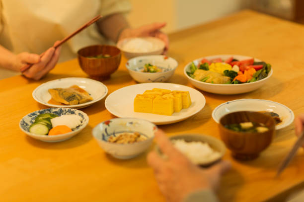 istock Senior couple eating dinner 1158574166
