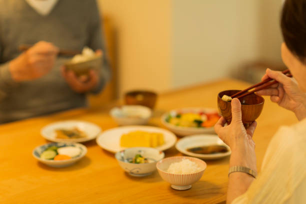 istock Senior couple eating dinner 1158574175