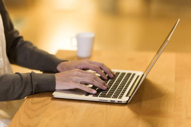 istock Woman operating a laptop 1158574187