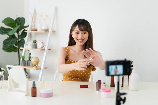 istock What is this. Pretty young woman sitting in front of the camera while testing cosmetics 1158574767
