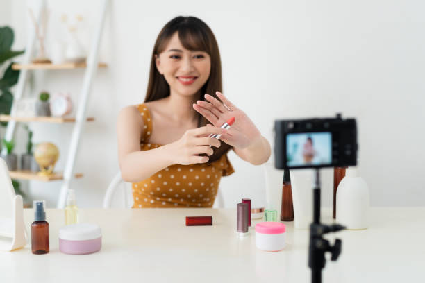 istock What is this. Pretty young woman sitting in front of the camera while testing cosmetics 1158574804