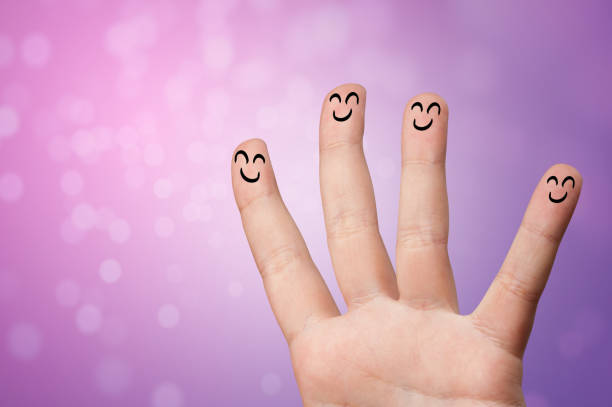 istock Happy little fingers smiling and hanging together 1158575582