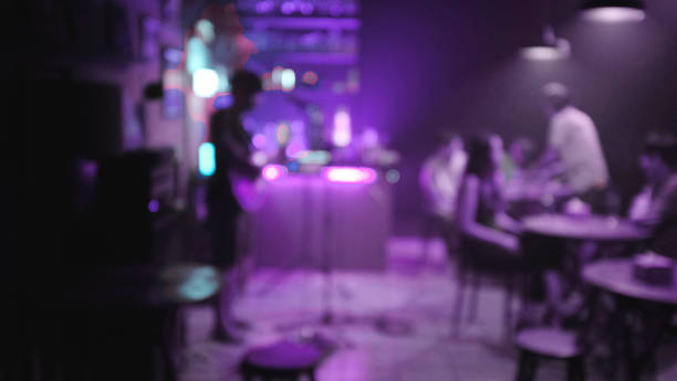 istock people having fun in a disco or night club. blur effect for an artistic touch 1158575662