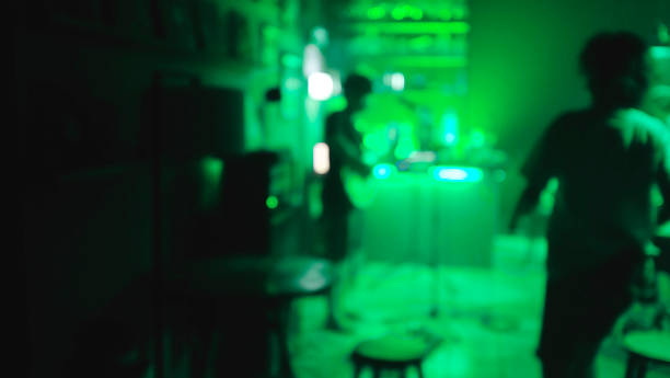 istock people having fun in a disco or night club. blur effect for an artistic touch 1158575708