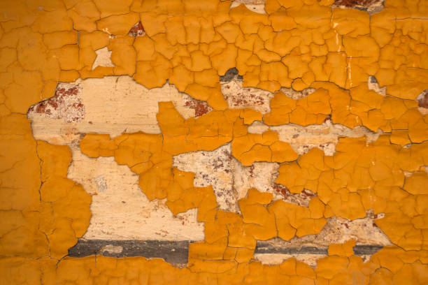 istock Rustic yellow crackled peeling paint background 1158575872