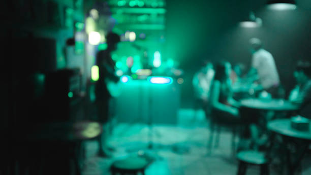 istock people having fun in a disco or night club. blur effect for an artistic touch 1158575966