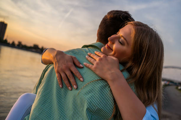 istock Loving couple in sunset 1158577196